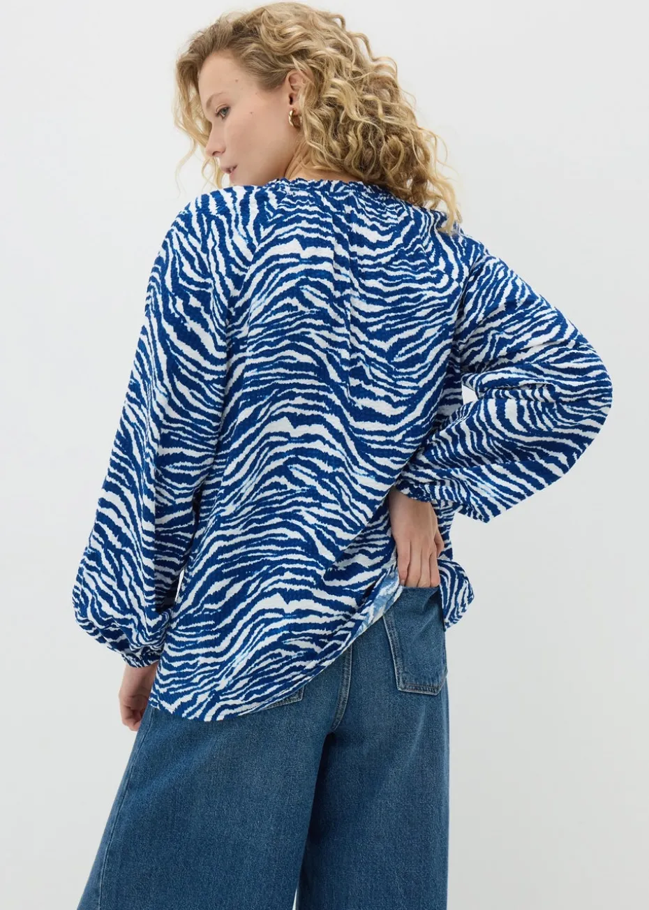 Blue Animal Print Tie Neck Blouse