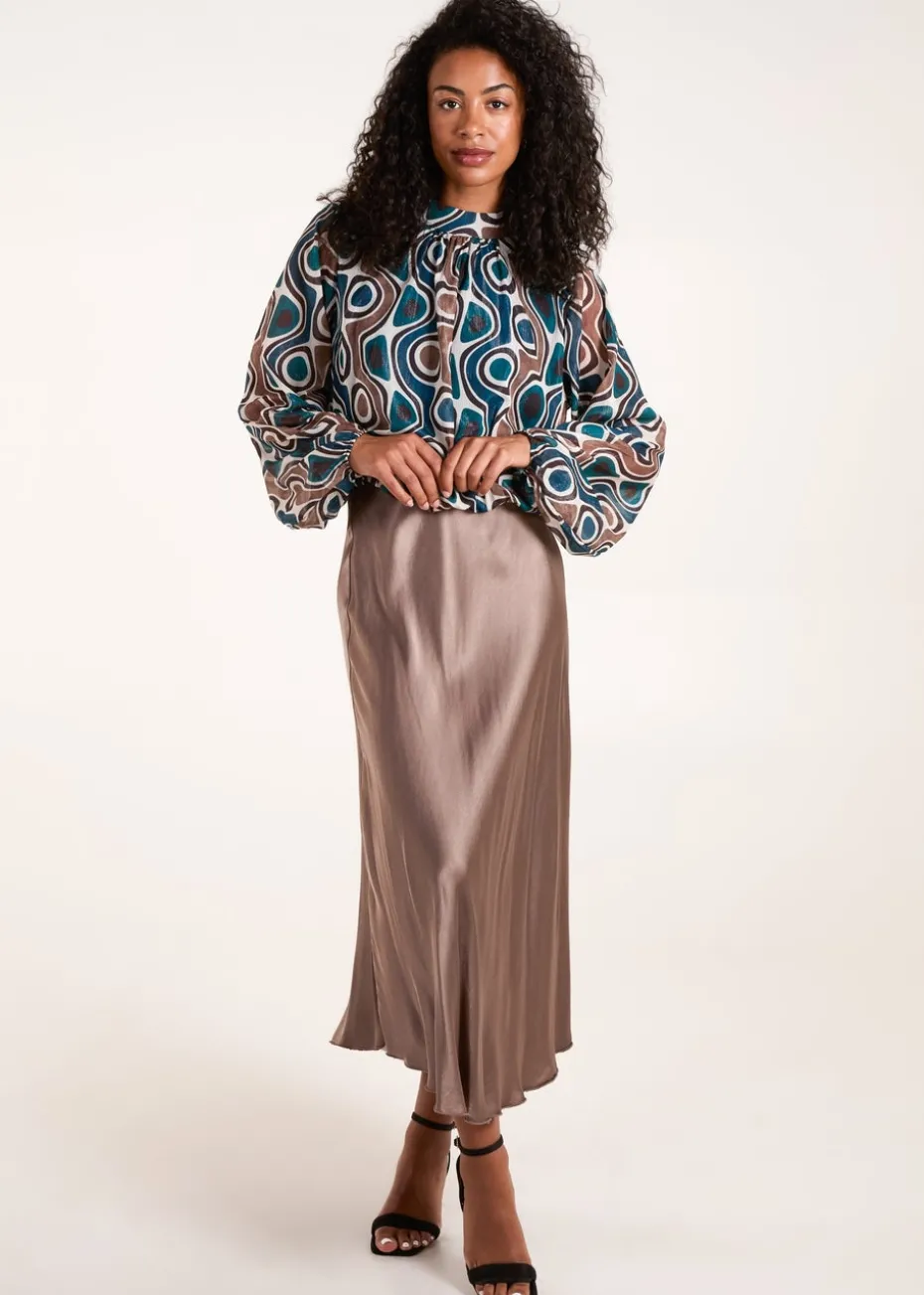 Blue Vanilla Teal High Neck Puffball Top