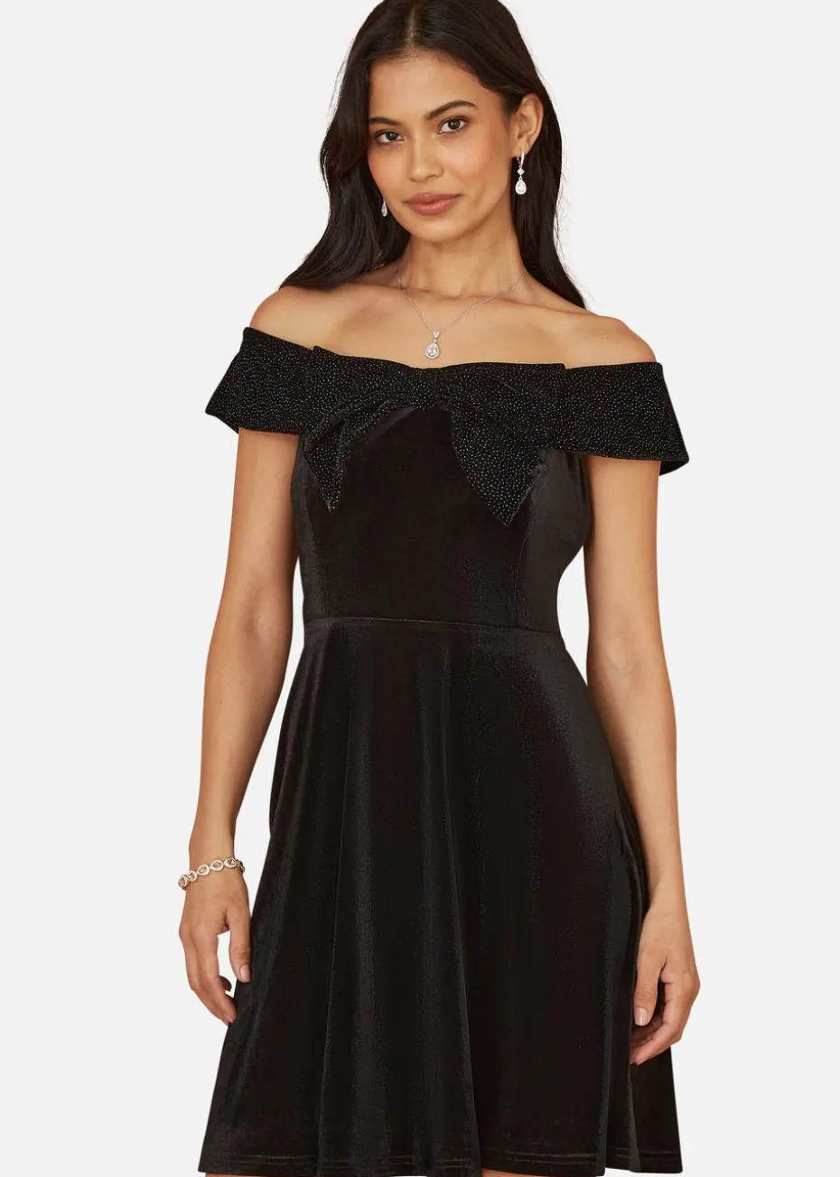 Mela Black Velvet Skater Dress With Sparkle Bow Neckline