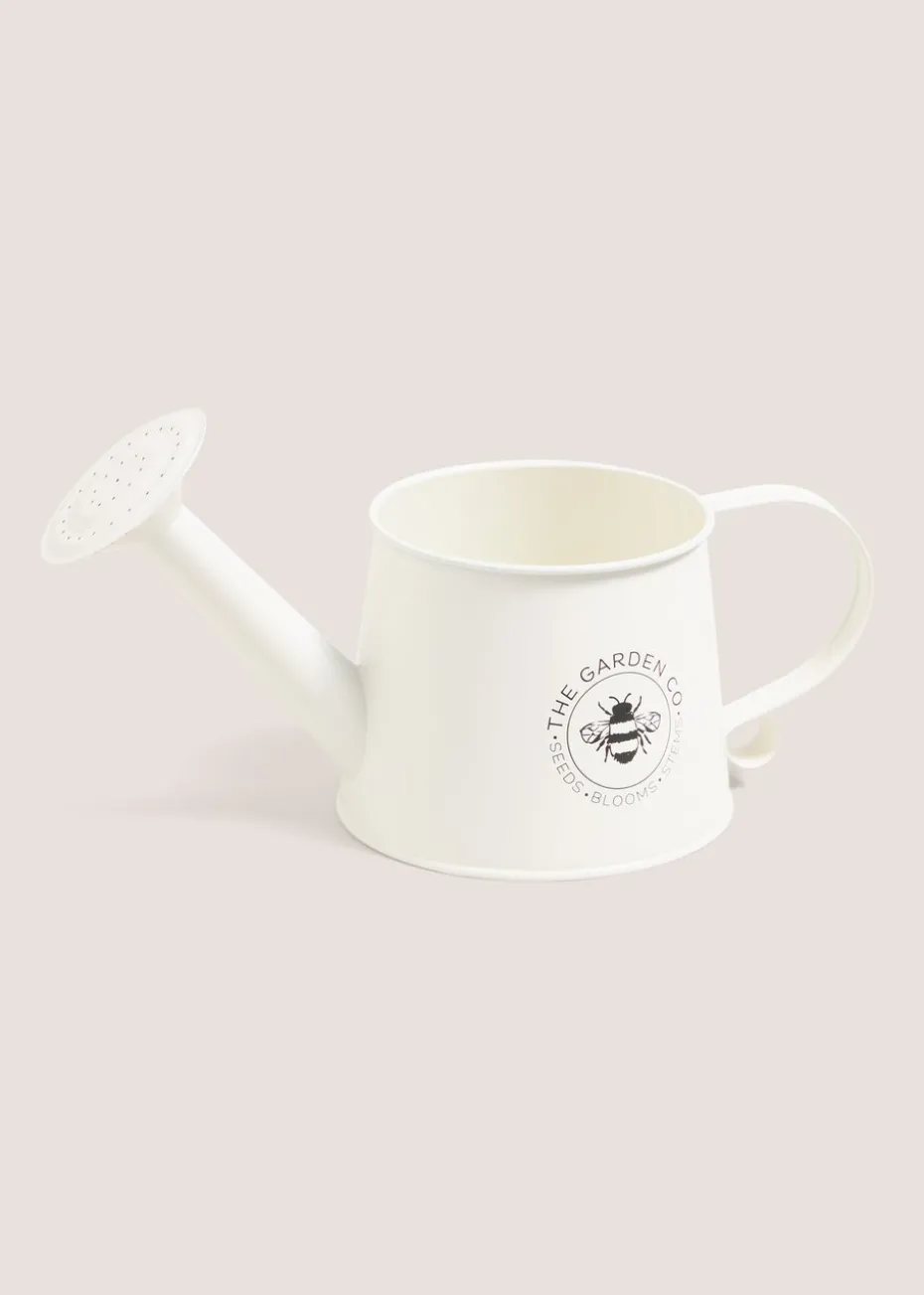 White Watering Can