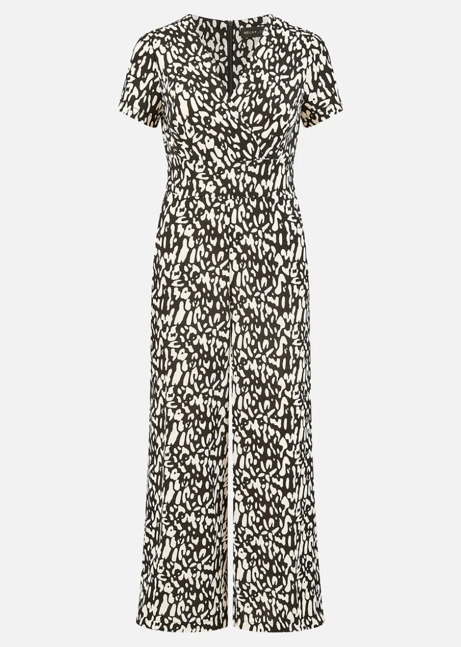 Yumi Black And White Wrap Over Stretch Jumpsuit